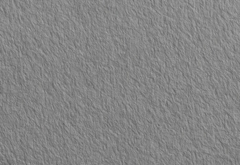 Gray textured background with fabric grain and concrete-like patterns, providing a versatile surface for design projects, web graphics, product mockups and photography backdrops