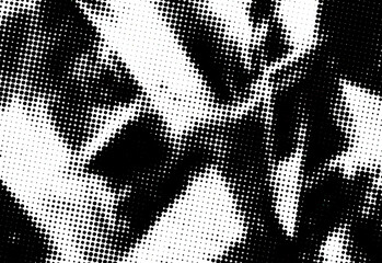 Fototapeta premium A high contrast black and white halftone abstract background featuring geometric shapes and tessellated dot texture, ideal for design projects, posters, prints, or digital wallpapers