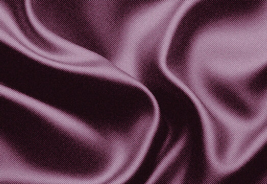 Close-up of luxurious purple satin fabric with deep folds and shimmering texture, soft shadows creating an abstract background ideal for fashion, interior design, and branding