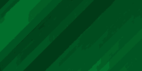 Abstract diagonal brush stroke pattern in varying shades of deep green for a textured background design © Kabita