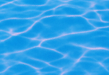 Crystal clear blue pool water surface with sunlit ripples and gentle waves, inviting summer refreshment, outdoor swimming, leisure, relaxation, and aquatic activity in bright light
