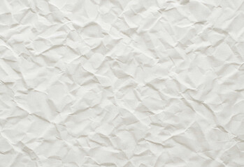 Soft beige crumpled paper texture background ideal for design projects, invitations, packaging mockups, scrapbooking, website backdrops, and creative photography compositions