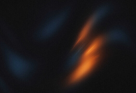 Abstract dark background featuring warm orange light streaks and cool blue accents, conveying a moody cinematic texture ideal for design, background, concept art