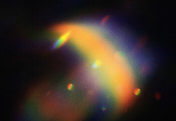 Vibrant colorful arc of light in deep space with faint stars and nebula glow, depicting a surreal cosmic phenomenon and dramatic spectral colors across a dark celestial canvas