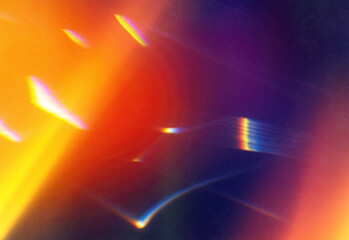 Abstract colorful light leaks and lens flare texture with warm orange and cool purple gradients, soft focus background for modern design, digital art, cinematic mood, vibrant glow