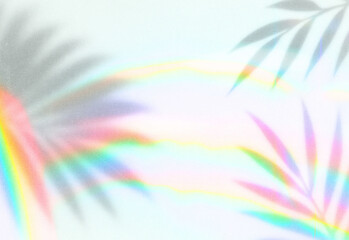 Fototapeta premium Dreamy tropical scene with softly blurred palm frond silhouette, pastel rainbow arcs, warm sunlit glow, and airy abstract background ideal for nature, travel, and summer visuals