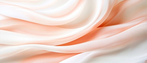 A soft, flowing fabric in shades of white and pale peach, showcasing delicate textures and gentle folds.