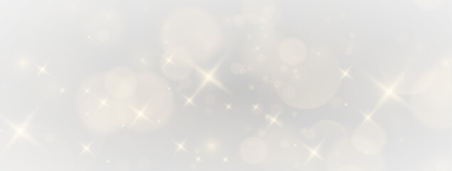 Twinkling festive atmosphere with sparkling dust clouds, magical flare ribbons and illuminated golden textures in a dreamy cosmic background © gleb