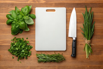 Fresh green herbs with kitchen knife and white cutting board on wooden surface, creating calm and natural cooking atmosphere
