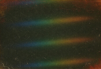 Dark grainy night scene with a star filled canvas, subtle rainbow light leaks forming diagonal bands across the surface, creating an abstract cinematic texture and atmosphere