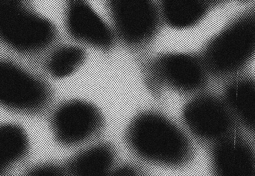 Close up abstract halftone texture featuring blurred circular black dots on a grayscale background, high contrast monochrome pattern ideal for design, print, backdrops and overlays