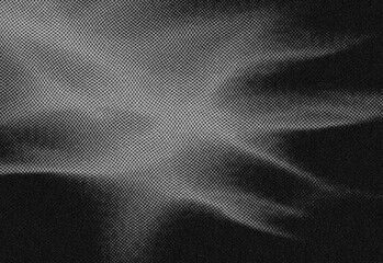 Close up abstract background featuring a radial starburst of soft light rays and dotted texture on a dark grayscale surface, ideal for dramatic design, moody visuals and branding