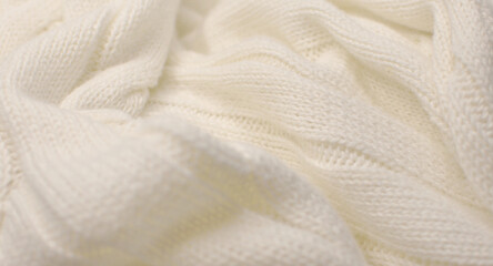 ブル編みのニット生地のテクスチャ　冬物衣類　セーター