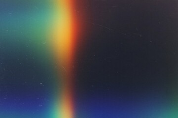 light leak overlay effect with scratch dust and colorful light leaks,retro grain noisy film flare on black background,analog old film burn overlay,abstract distressed background with rays and lens