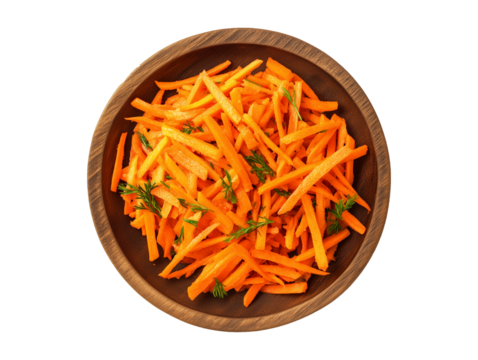Freshly grated carrots in a wooden bowl garnished with herbs ready for a healthy salad or garnish
