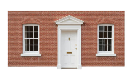 A Classic Red Brick Georgian Facade With A White Georgian Door And Two White Georgian Windows Featuring An Elegant Pediment Above The Door And Sunlight Illuminating The Entrance