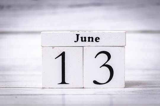 Wooden calendar blocks showing the date June 13. Perfect for reminders or themed decorations. Ideal for events, marketing promotions, and blogging content.