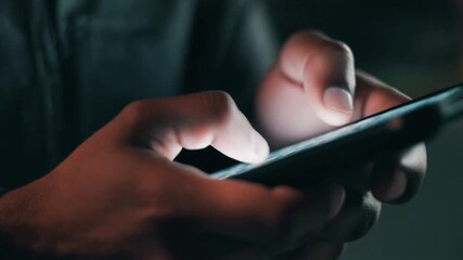 Night, cybersecurity and hands typing with phone for texting, internet troll or person cyberbullying. Dark comment, social media netizen or keyboard warrior for smartphone, online bullying or hacking
 - Powered by Adobe