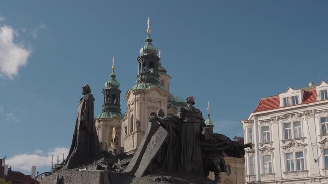 Jan Hus Memorial and St. Nicholas Church in Old Town Square Prague