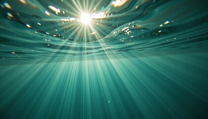 Underwater view looking up at sunlight rays ocean nature scene tranquil environment aesthetic conceptual