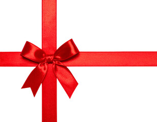 Red satin ribbon tied into a bow against black background