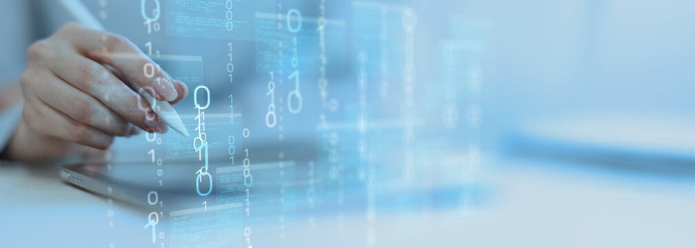 Binary Code and Digital Data Streams Displayed on Futuristic Transparent Interface.