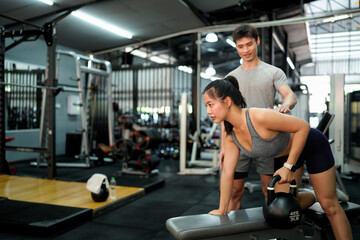 gym sport fitness exercise health woman weight training kettlebell trainer coach instructor personal equipment strong healthy fit active workout body man activity