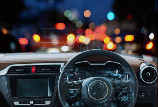 Modern car interior showing augmented reality dashboard and holographic display with traffic data during nighttime urban driving scene. - Powered by Adobe