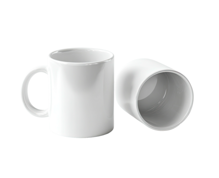 Two white ceramic mugs, one upright, one tilted