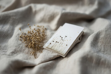 handcrafted christmas card rests elegantly on linen napkin embodying essence of holiday magic