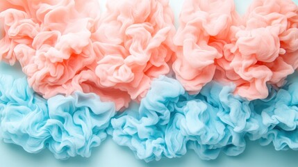 Abstract swirls of pale pink and blue paint