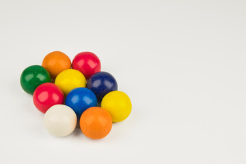 Colorful, circular chewing gum, very appealing to children. Copy space on a white background