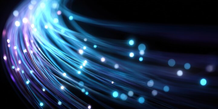 Colorful light trails create a vibrant abstract pattern in a dark setting, emphasizing movement and energy in visual art - Powered by Adobe