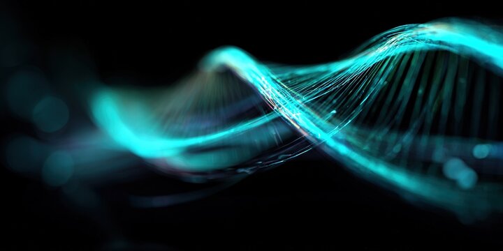 Bright blue and green wavy lines create a dynamic abstract pattern in a dark setting, showcasing light and movement effects