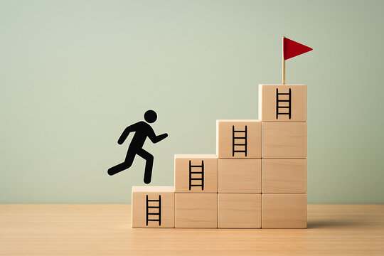 Man running up a staircase made of wooden blocks with ladder icons toward a red flag, symbolizing career path, goal setting, motivation, achievement, and business success development