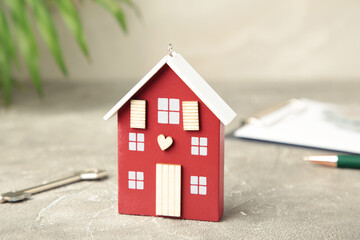 Traditional easter cakes with colorful sprinkles, with eggs and spring flowers on blue background.