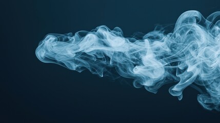 Fototapeta premium A swirling blue smoke pattern against a dark background, creating a sense of depth and movement.
