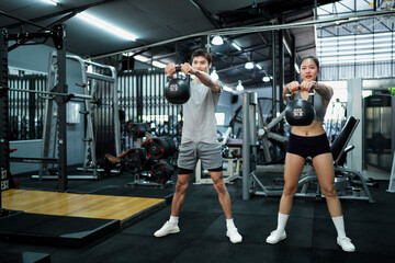 gym sport fitness exercise health woman weight training kettlebell trainer coach instructor personal equipment strong healthy fit active workout body man activity