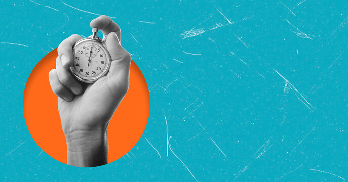 Hand holding a stopwatch against a bright background, symbolizing time management and urgency in daily tasks