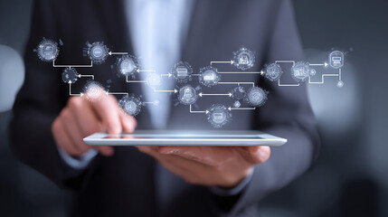 A person interacting with digital information on a tablet, showcasing modern technology and data flow 