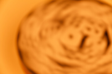 Close-up of several dice inside a rotating container