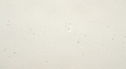 Subtle Textured Light Gray Surface with Small Dark Specks