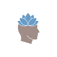 Human head silhouette with lotus flower blooming, symbolizing mindfulness and inner peace in a serene and calming atmosphere.