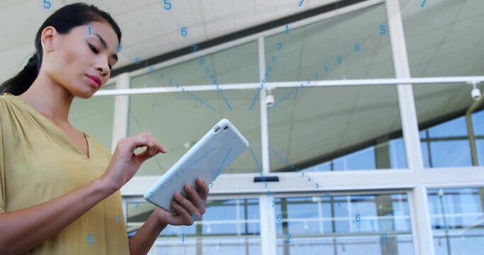 Woman entering left holding tablet, tapping screen and activating blue HUD over glass for tech demo