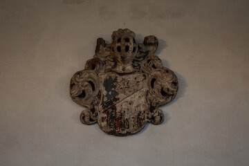 Old wooden chests with metal fittings placed in a medieval castle interior, showing antique craftsmanship, aged textures, and historical ambiance.