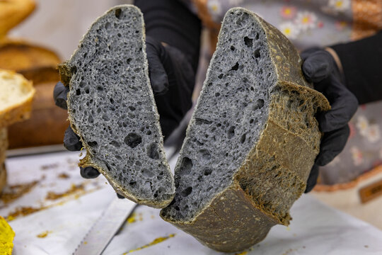 Fresh bread from the oven at a small artisan bakery at home. Very healthy sourdough bread products of various types.