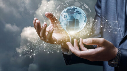 Global network connection concept with businessman hands holding digital globe and abstract connections representing data flow and digital transformation