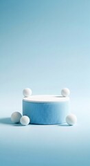 A blue textured cylindrical pedestal with white spheres on a light blue background
