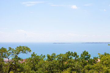 Morning view of the sea from the shore. Outdoor background. Copy space.