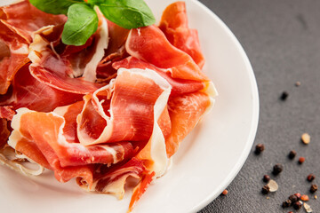 jamon serrano meat appetizer jamon iberico natural product tasty snack fresh delicious gourmet food background on the table rustic top view copy space